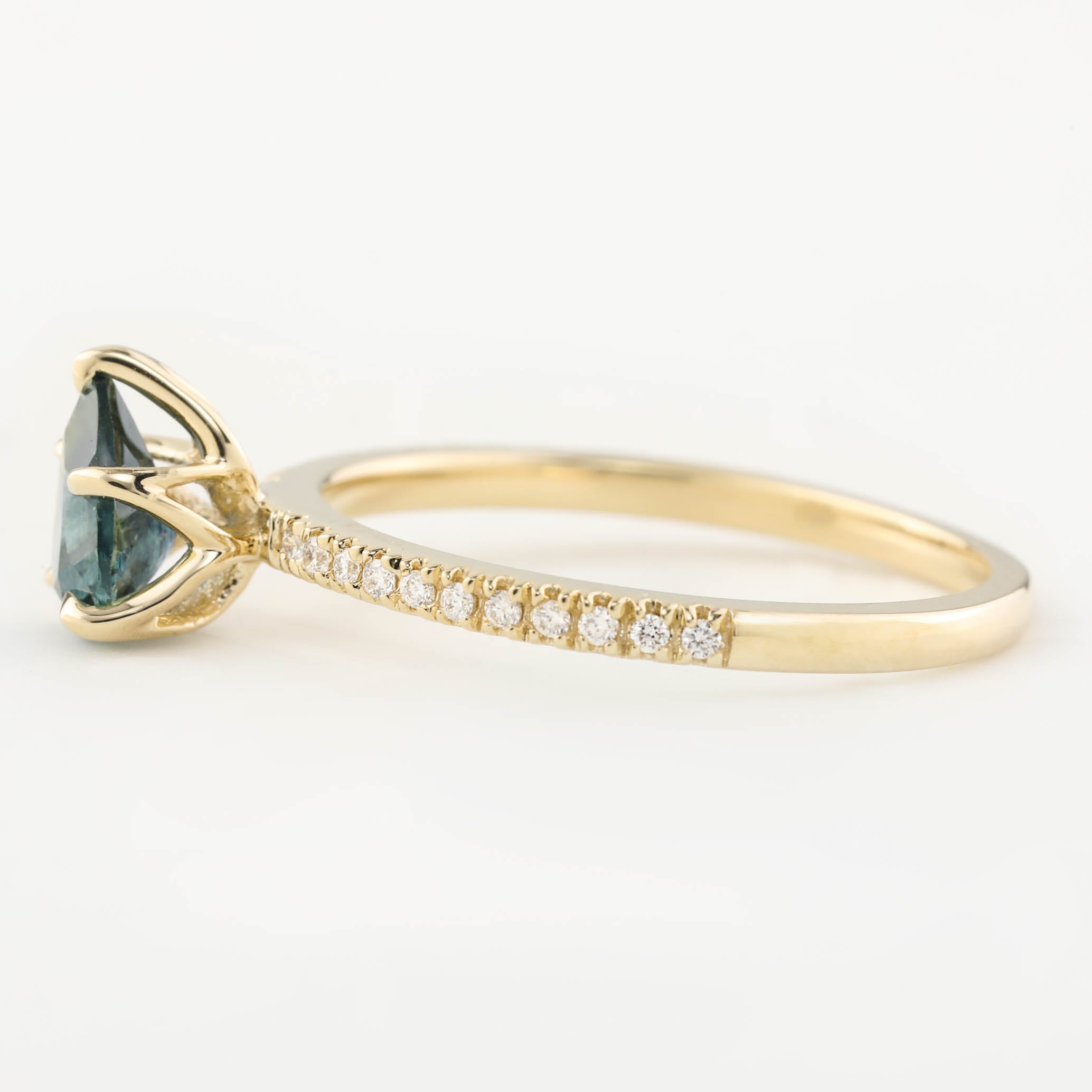 Maria Ring, 0.8ct Montana Sapphire with natural diamond accents, handmade in recycled 14k yellow gold band.