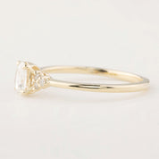 14k yellow gold Teresa Ring with 0.45ct oval rose cut diamond and white accent diamonds in flower setting