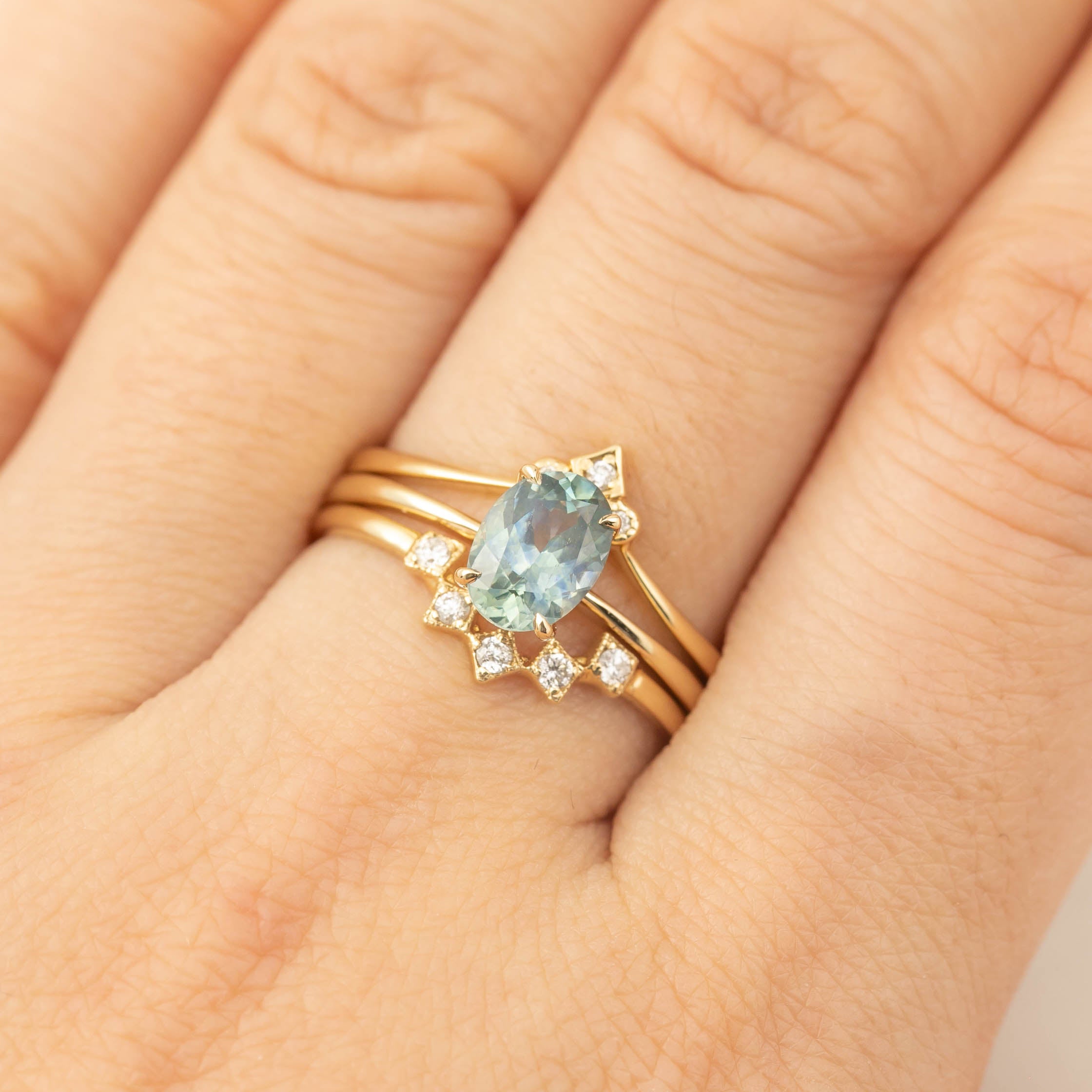 Nina Ring with 1.26ct light blue Montana sapphire set in 14k yellow gold, one of a kind handmade design by Envero Jewelry.