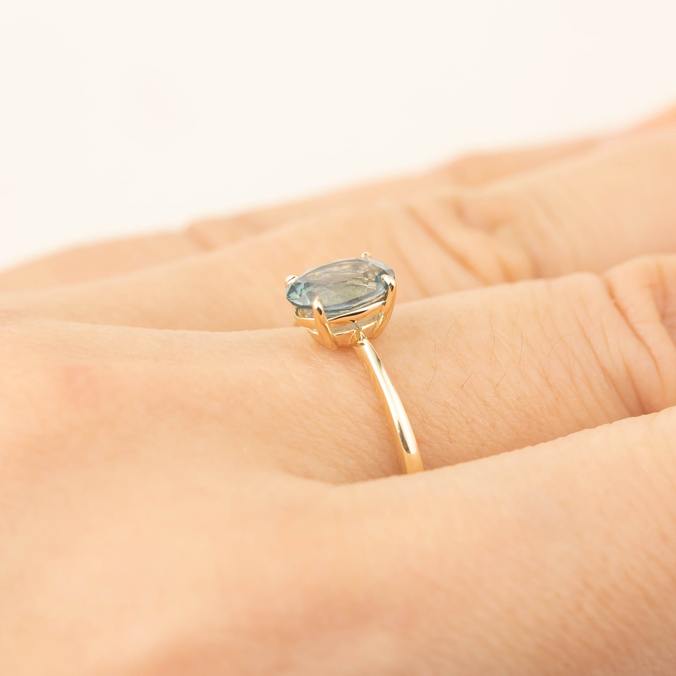 Nina Ring with 1.26ct light blue Montana sapphire set in recycled 14k yellow gold, handmade and one of a kind