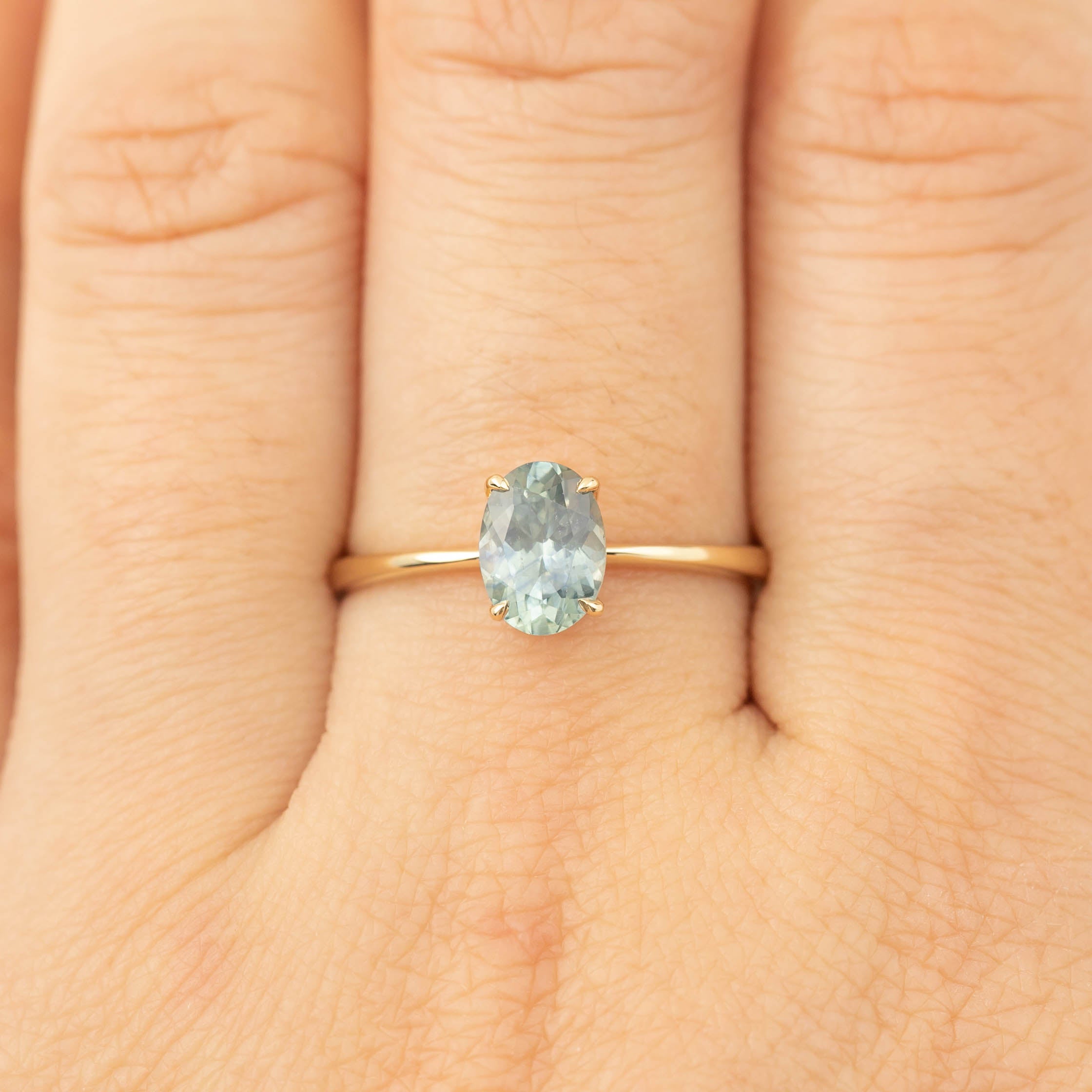 Nina Ring with 1.26ct light blue Montana sapphire set in recycled 14k yellow gold, handmade and one of a kind.