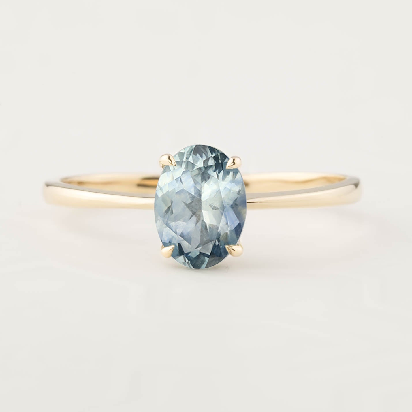 Nina Ring with 1.26ct light blue Montana Sapphire in 14k yellow gold, one of a kind, ethically sourced design