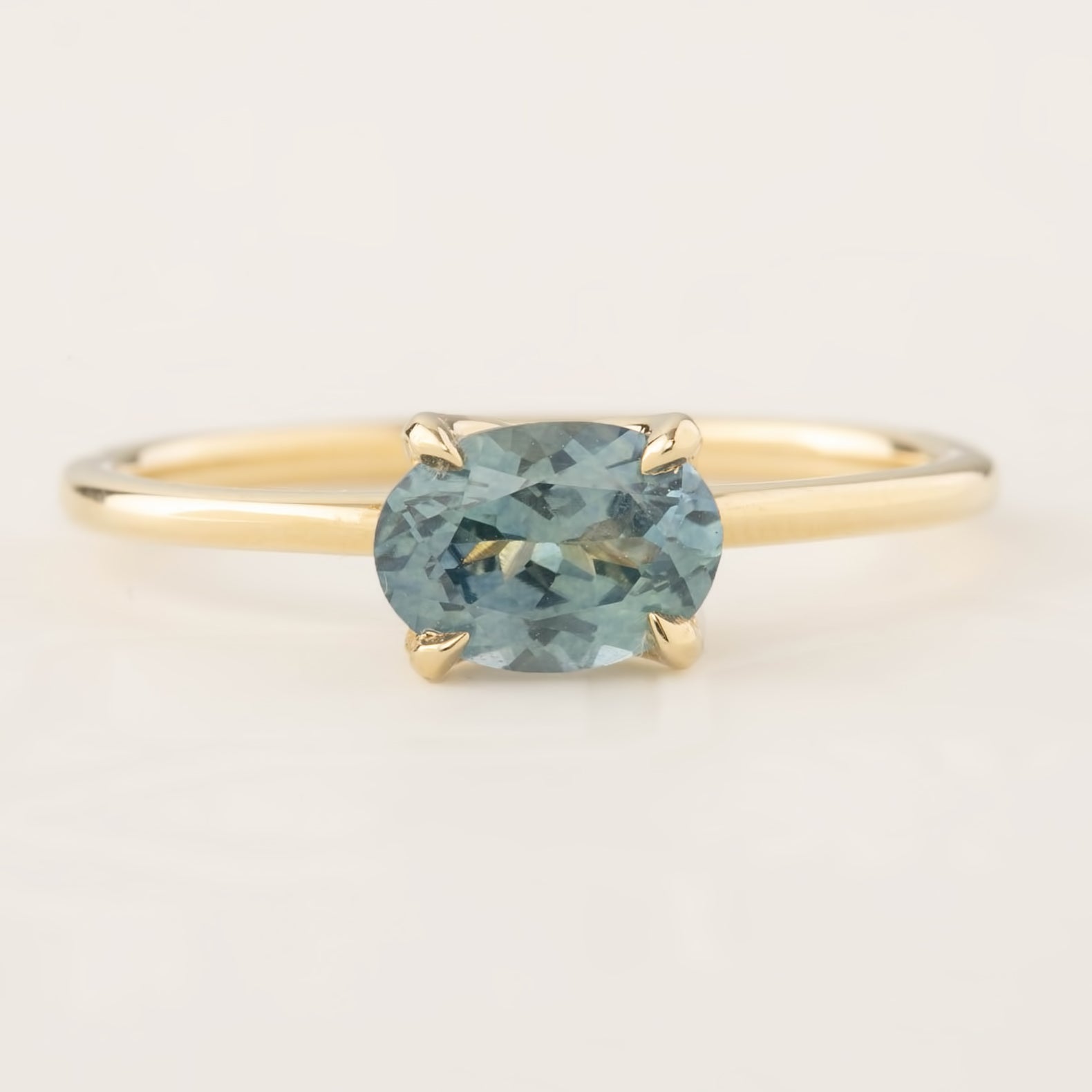 Sara Ring with 1.05ct blue green Montana sapphire set in recycled 14k gold, handmade and ethically sourced design
