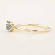 Sara Ring with 1.05ct blue-green Montana sapphire, handmade with recycled 14k yellow gold, ethically sourced gemstones.