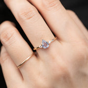 Emilie Ring featuring unheated blue teardrop sapphire and diamonds in 14k recycled rose gold, handmade and authentic