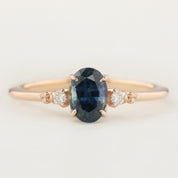 Estel Ring with 0.83ct teal blue Montana sapphire and white diamonds in 14k rose gold, handmade and ethically sourced.