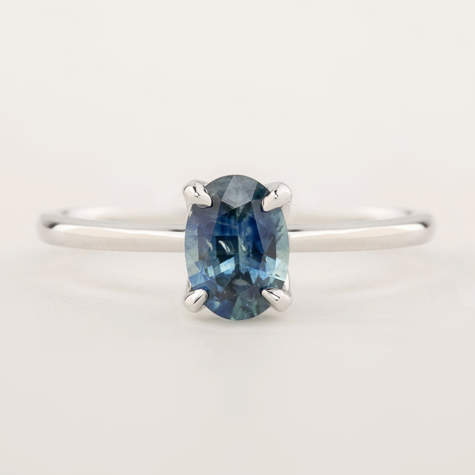 Sara Ring featuring a 0.86ct parti blue green Montana sapphire in recycled 14k white gold, one of a kind design
