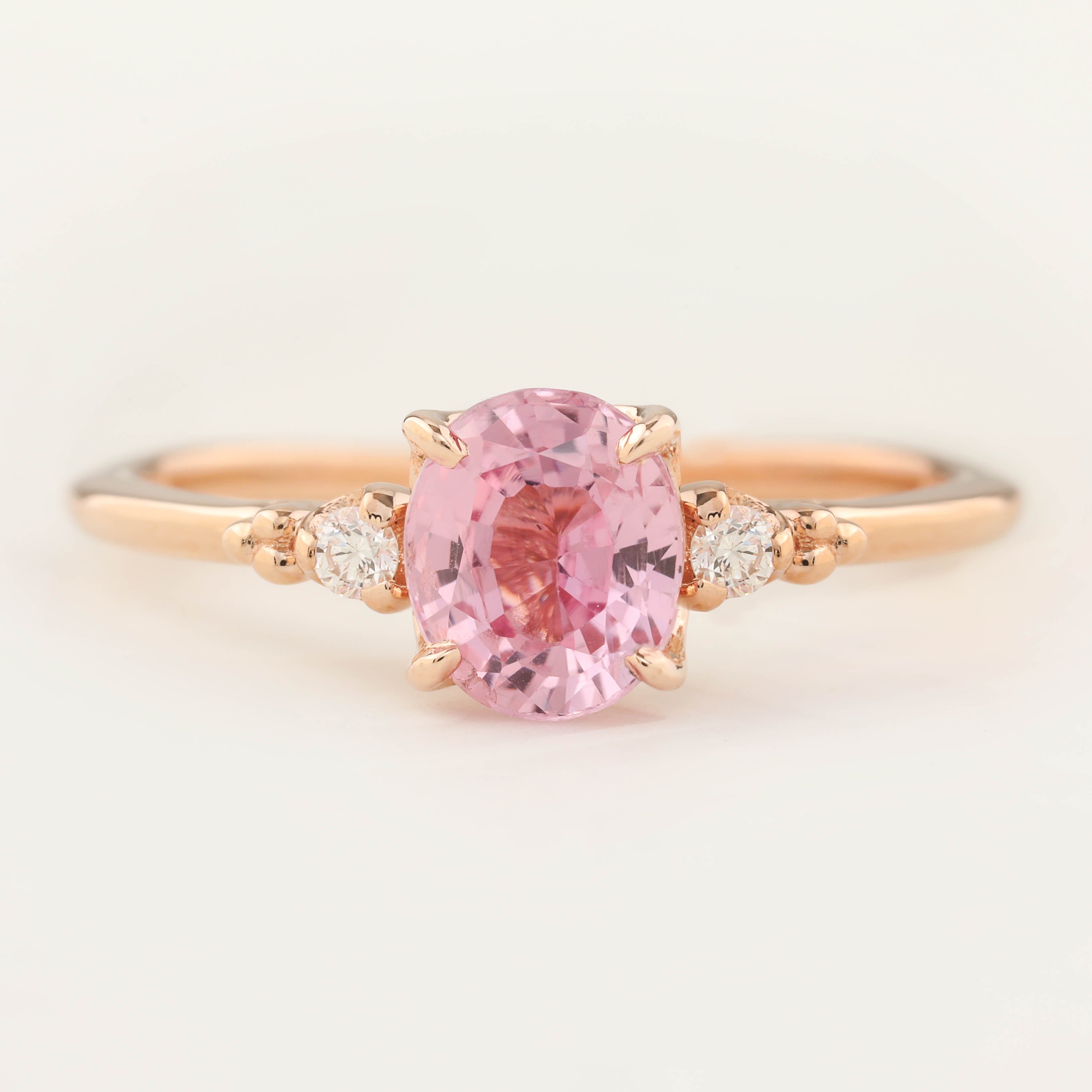 Estel Ring with 1.12ct pink sapphire and white diamonds in 14k rose gold, handmade and ethically sourced design.