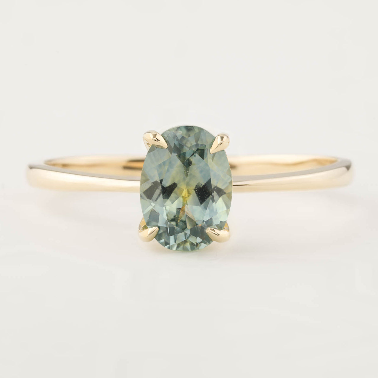 Nina Ring with 1.04ct light green Montana sapphire in recycled 14k yellow gold, handmade and one of a kind