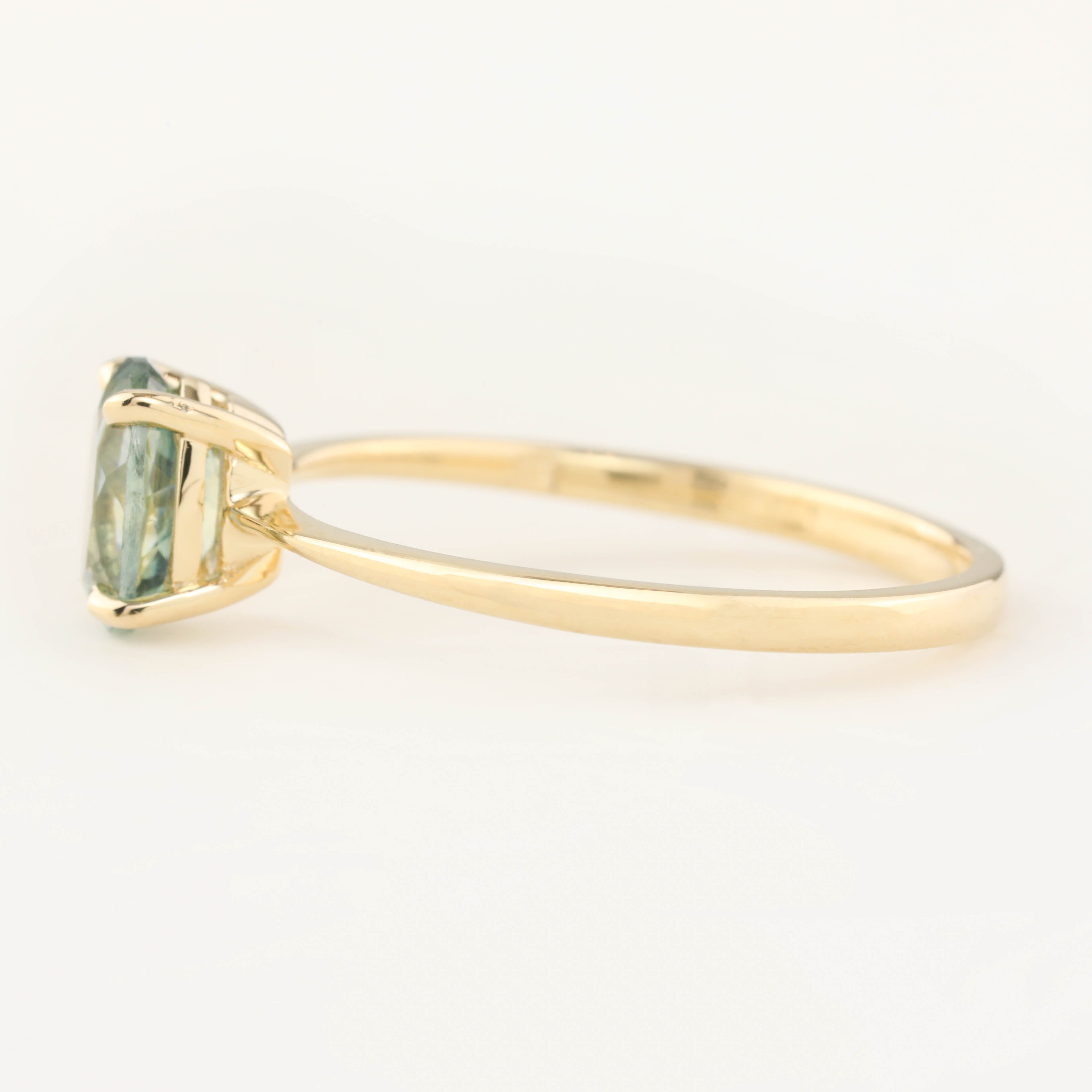 Nina Ring featuring a 1.04ct light green Montana sapphire set in recycled 14k yellow gold, handmade and one of a kind.