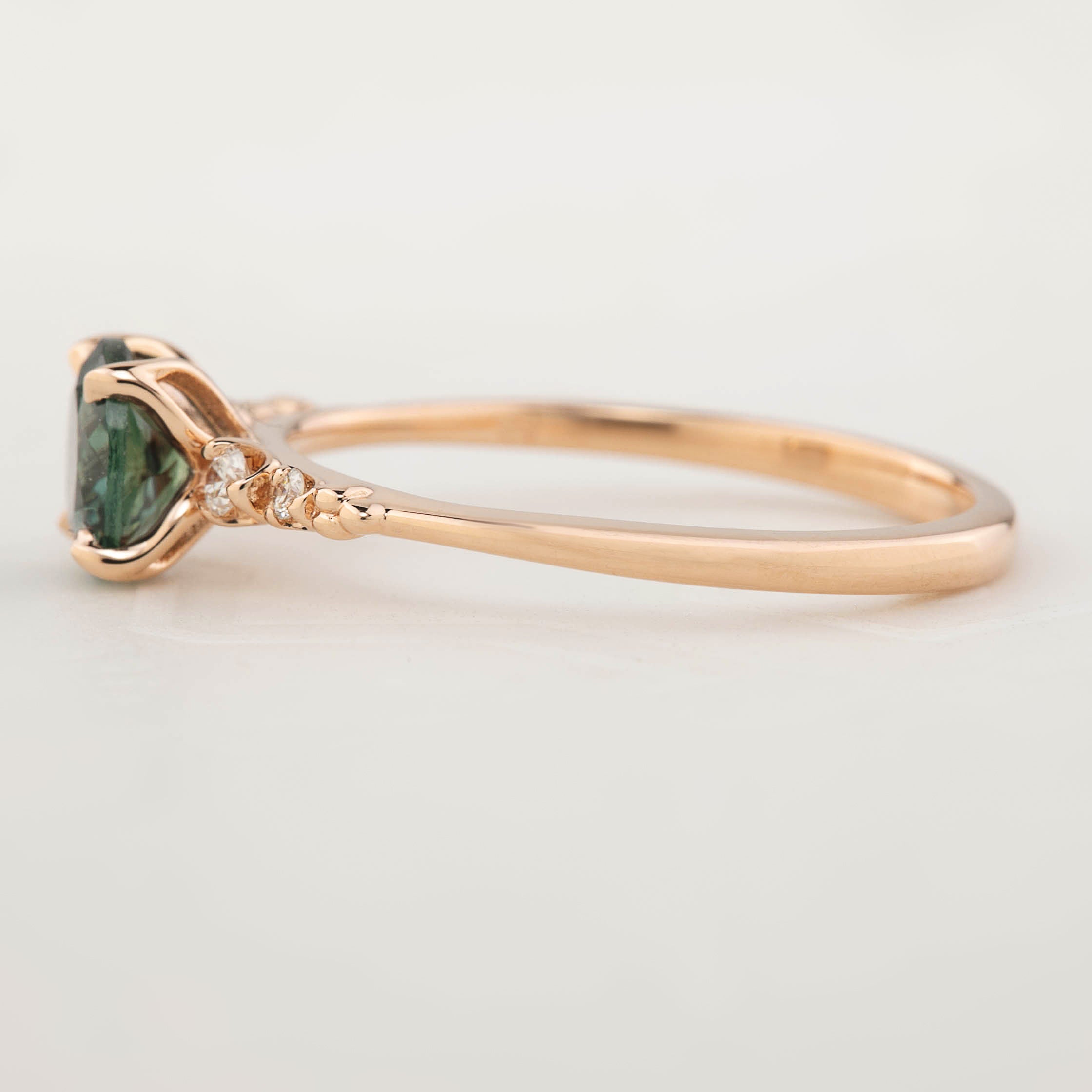 Estel Luxe Ring featuring a 0.97ct peacock green Montana sapphire set in recycled rose gold, one of a kind and handmade.