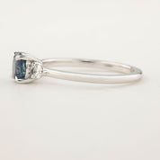 Emilie Ring with 0.85ct Blue Montana Sapphire, handmade in recycled 14k white gold with accent diamonds, one of a kind design