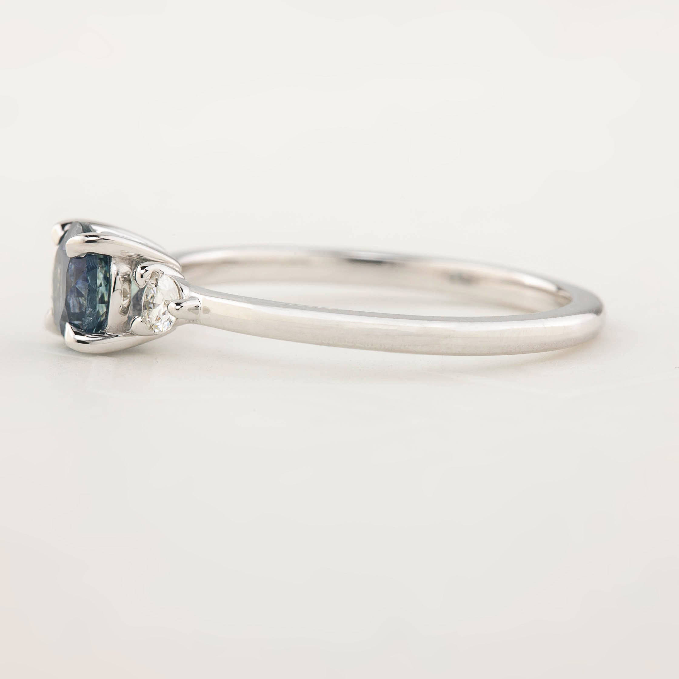 Emilie Ring with 0.85ct Blue Montana Sapphire, handmade in recycled 14k white gold with accent diamonds, one of a kind design