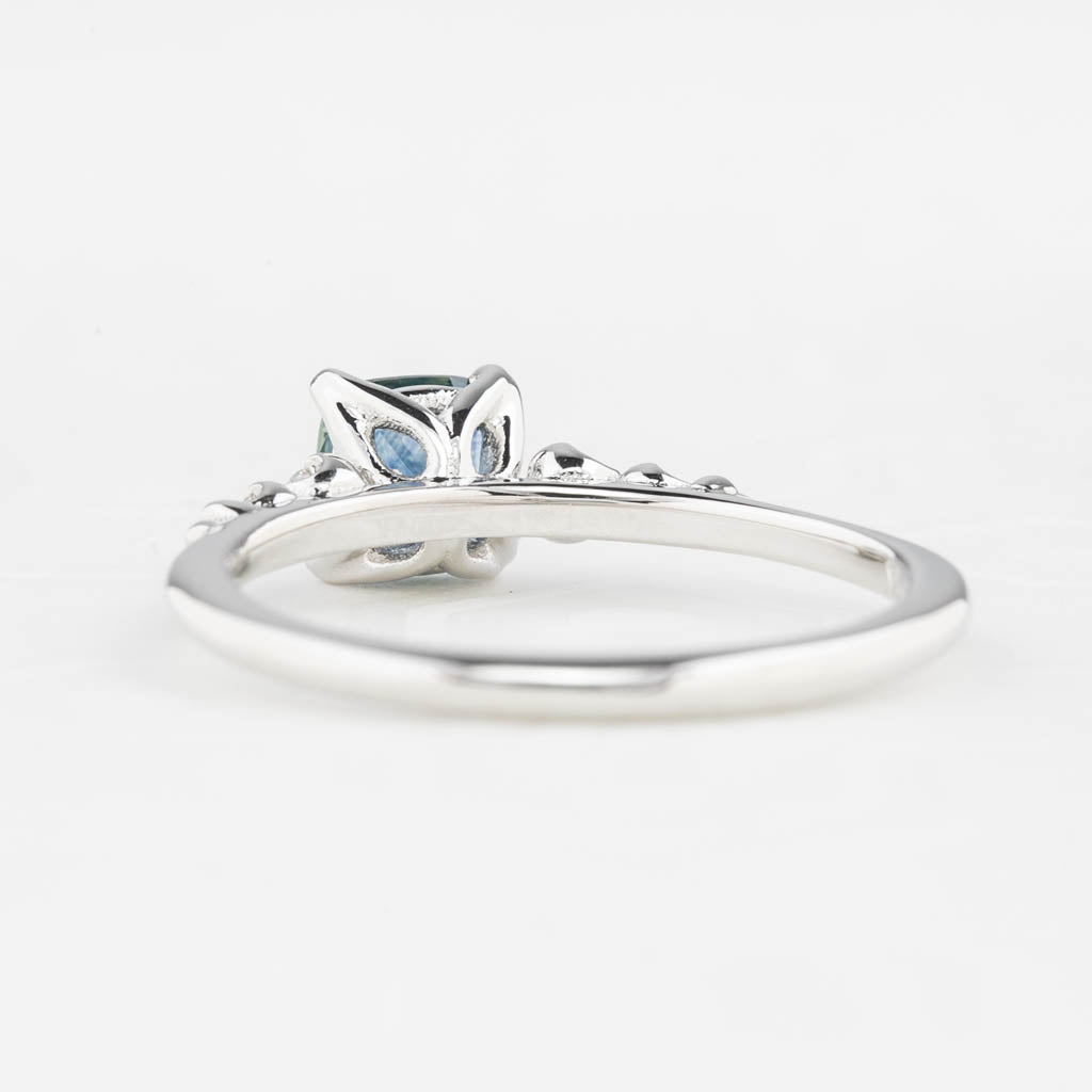 Estel Fleur Ring, 0.72ct Dark Blue Montana Sapphire