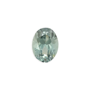 2.45ct oval cut light green Montana sapphire, handmade and ethically sourced with subtle blue hues and clarity.