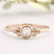 Rose gold Faye ring with 4mm rose cut diamond and six smaller diamonds on slender band