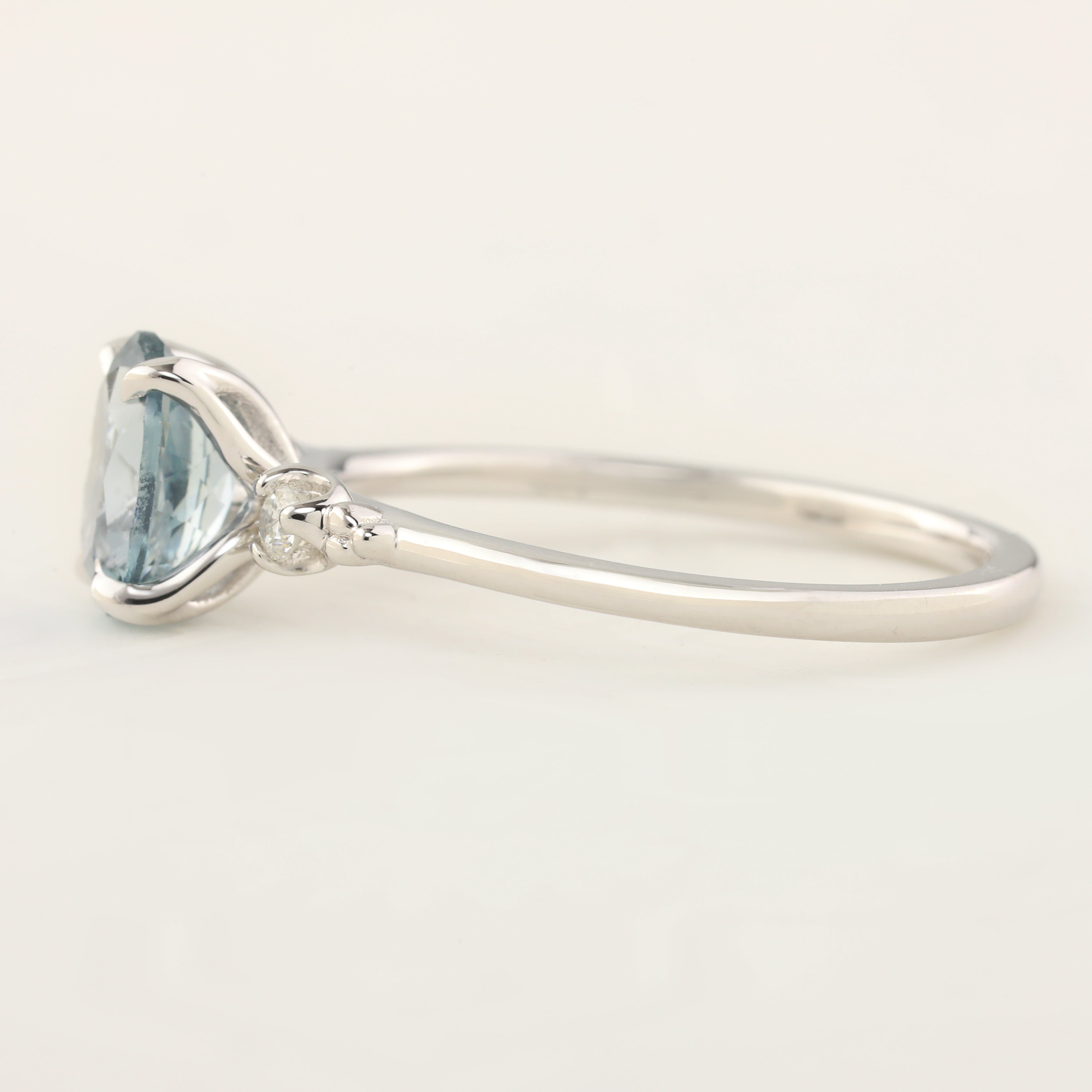 Stunning Estel Ring featuring a 1.36ct light blue Montana Sapphire, set in 14k white gold with sparkling diamond accents.