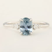 Stunning one-of-a-kind Estel Ring featuring a 1.36ct light blue Montana Sapphire in a 14k white gold flower setting.