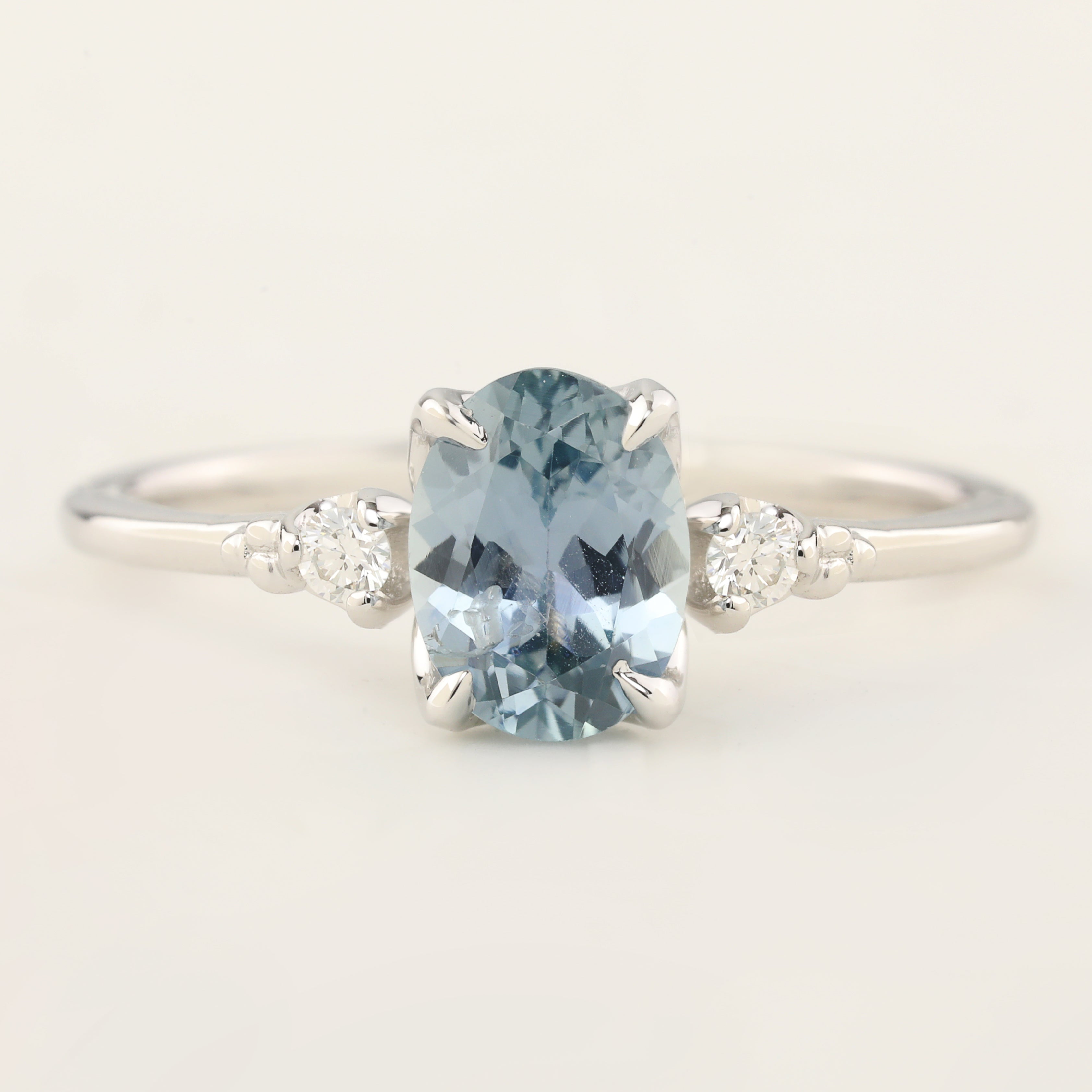 Stunning one-of-a-kind Estel Ring featuring a 1.36ct light blue Montana Sapphire in a 14k white gold flower setting.