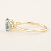 Estel Ring with 1.4ct light blue-green Montana Sapphire set in recycled 14k yellow gold, one of a kind handmade design.