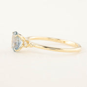 Estel Ring 1.02ct Blue Oval Montana Sapphire set in recycled 14k yellow gold with natural diamond accents, one of a kind.