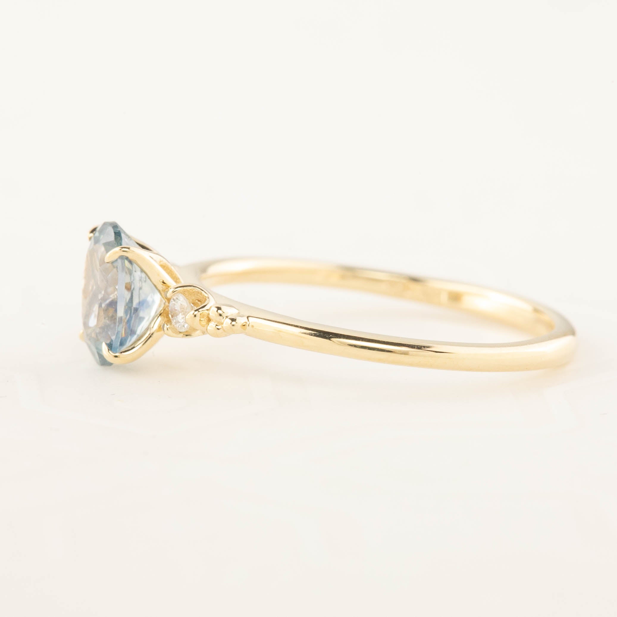 Estel Ring 1.02ct Blue Oval Montana Sapphire set in recycled 14k yellow gold with natural diamond accents, one of a kind.