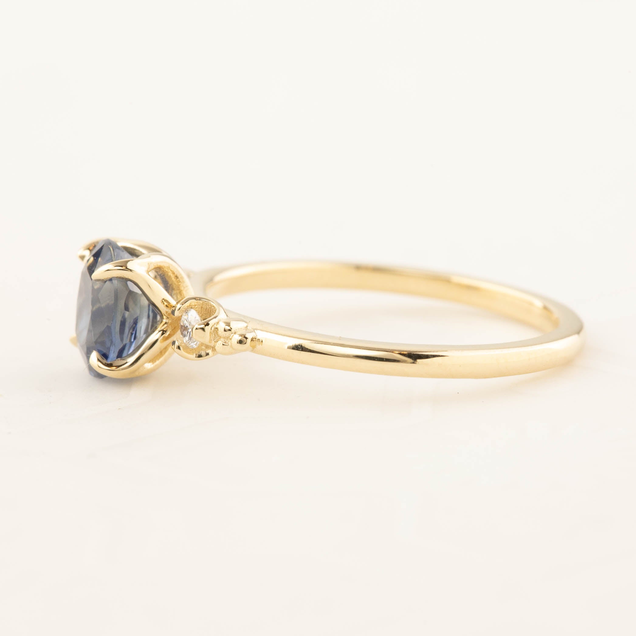 Estel Ring with 1.41ct blue sapphire in a handcrafted recycled 14k gold setting, one of a kind and ethically sourced.
