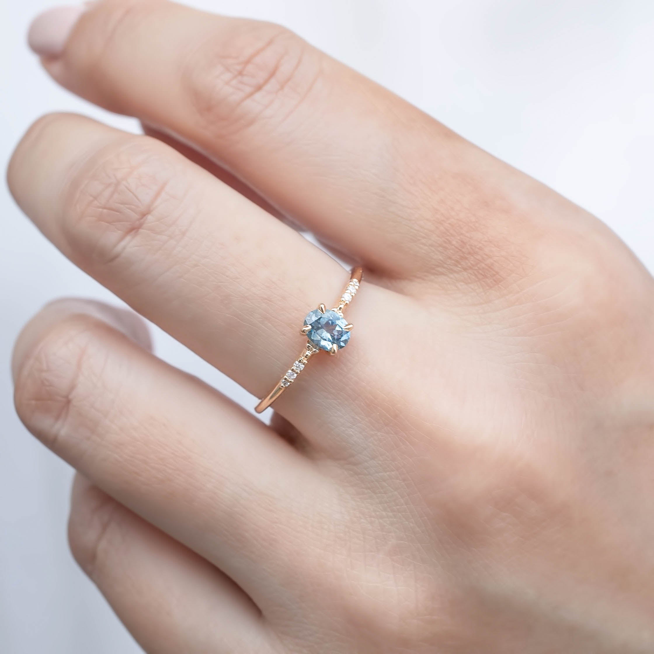 Eloise Ring with a 0.45ct unheated oval sapphire and diamond pave band in 14k yellow gold with a stack ring.