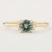 Lena Ring with 0.65ct light mint green Montana sapphire, handmade, ethically sourced, set in recycled 14k yellow gold