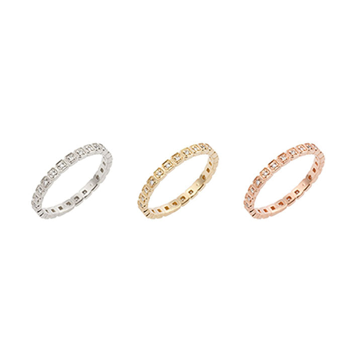 Set of three Hazel Eternity Rings in white, yellow, and rose gold with natural white diamonds, 2mm band width.