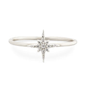 14k white gold starburst diamond ring with pave set diamonds on a slim 1.3mm band, size 7.5x9.0mm center design