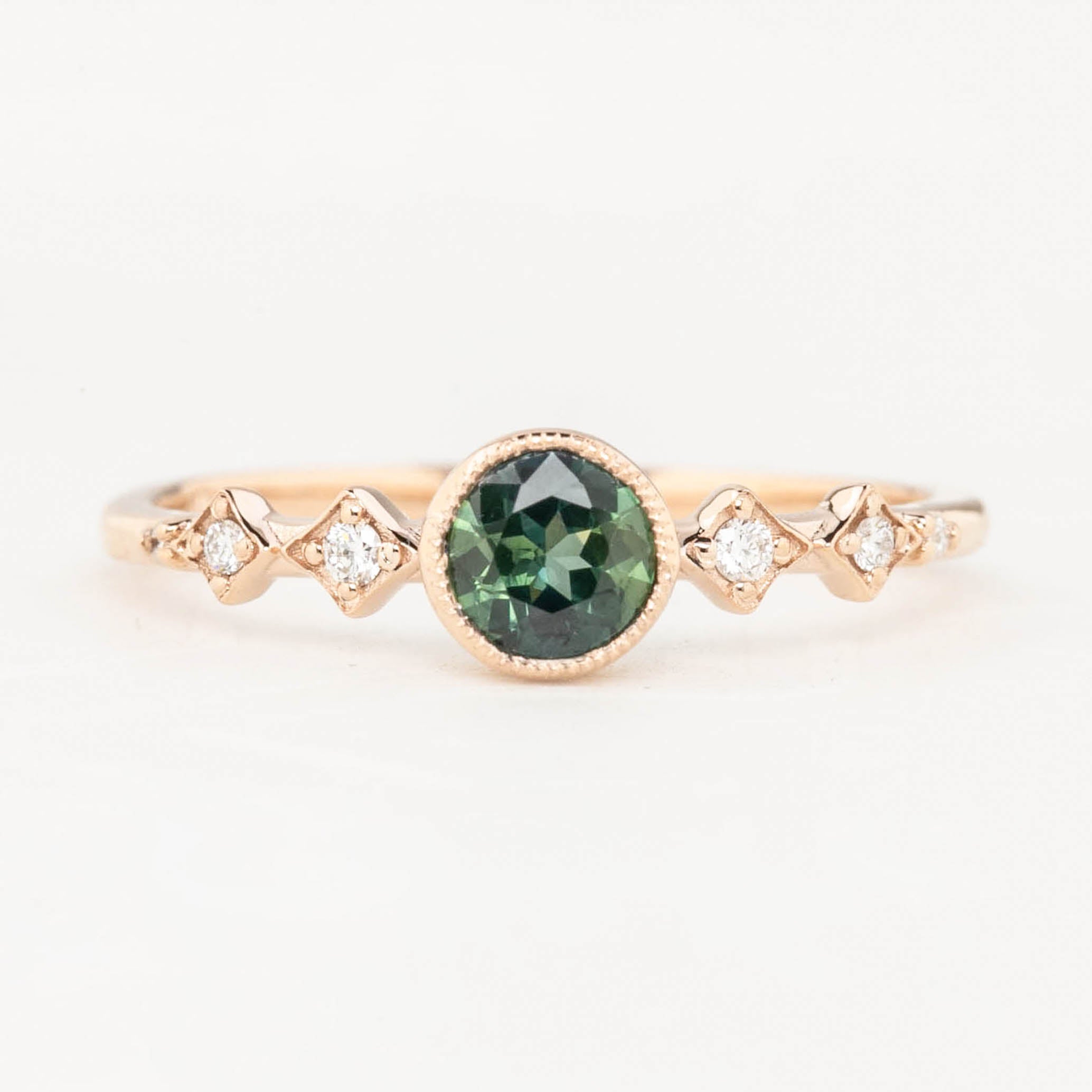 0.50ct green Queensland Sapphire Ring in 14k rose gold