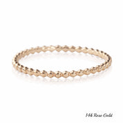 14k rose gold bead eternity ring with 1.5mm band, solid gold, full eternity style, ethically sourced, non-resizable design