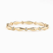 Elegant Aria Eternity Ring featuring natural white diamonds set in a 1.5mm solid gold band in full eternity style.