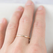 Handmade Half-Round Straight Band (1.3mm) on finger, ethically sourced recycled metal by Envero Jewelry Etsy.